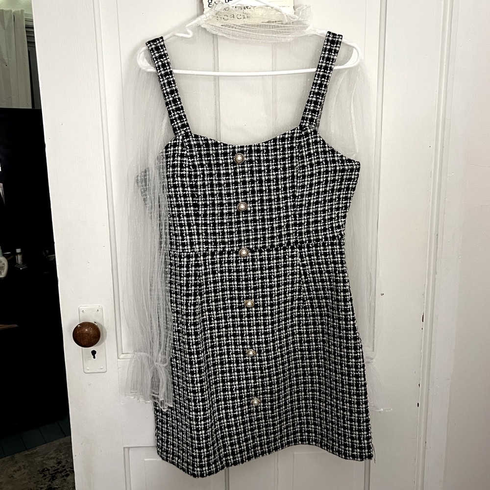 Plaid tweed dress with lace turtle neck undershirt.